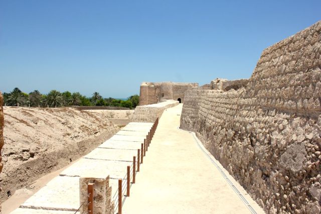 along the fort's upper, outer wall